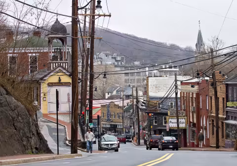 Ellicott city street with telephone poles and cars